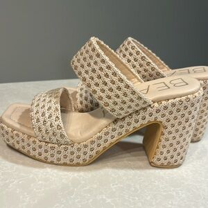 Size 9 nude platform slide on heels. Only worn twice